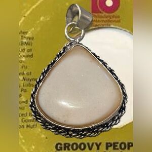 Elegant Silver and Cream Pendant